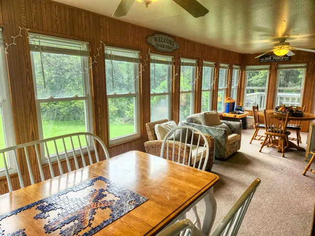 a living room with furniture and a table