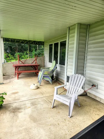 a building outdoor space with patio furniture