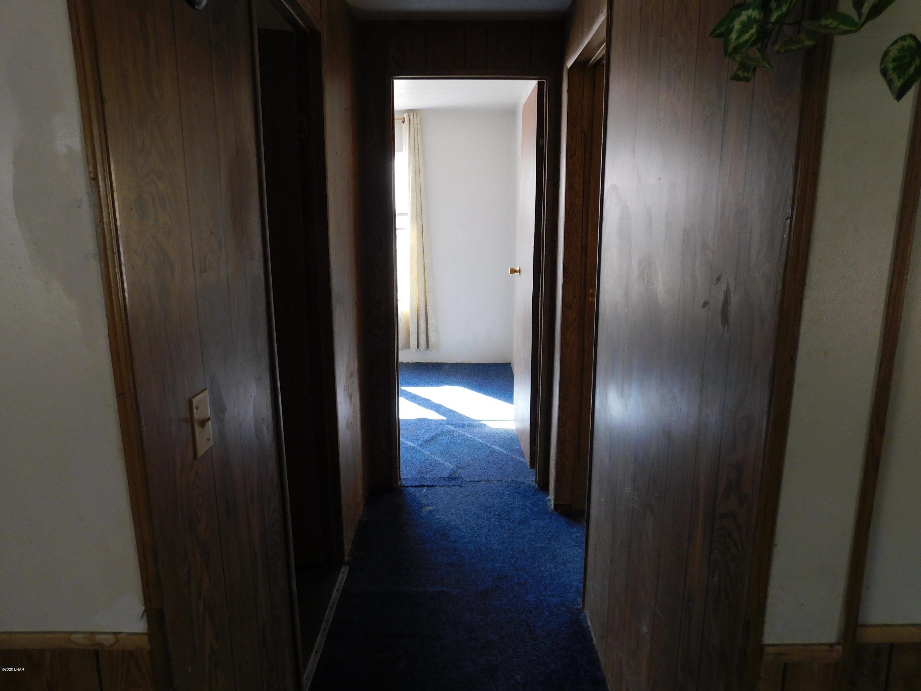 455 Mayflower Street Quartzsite, AZ 85346 - Photo 19 of 32 Hallway towards bedrooms