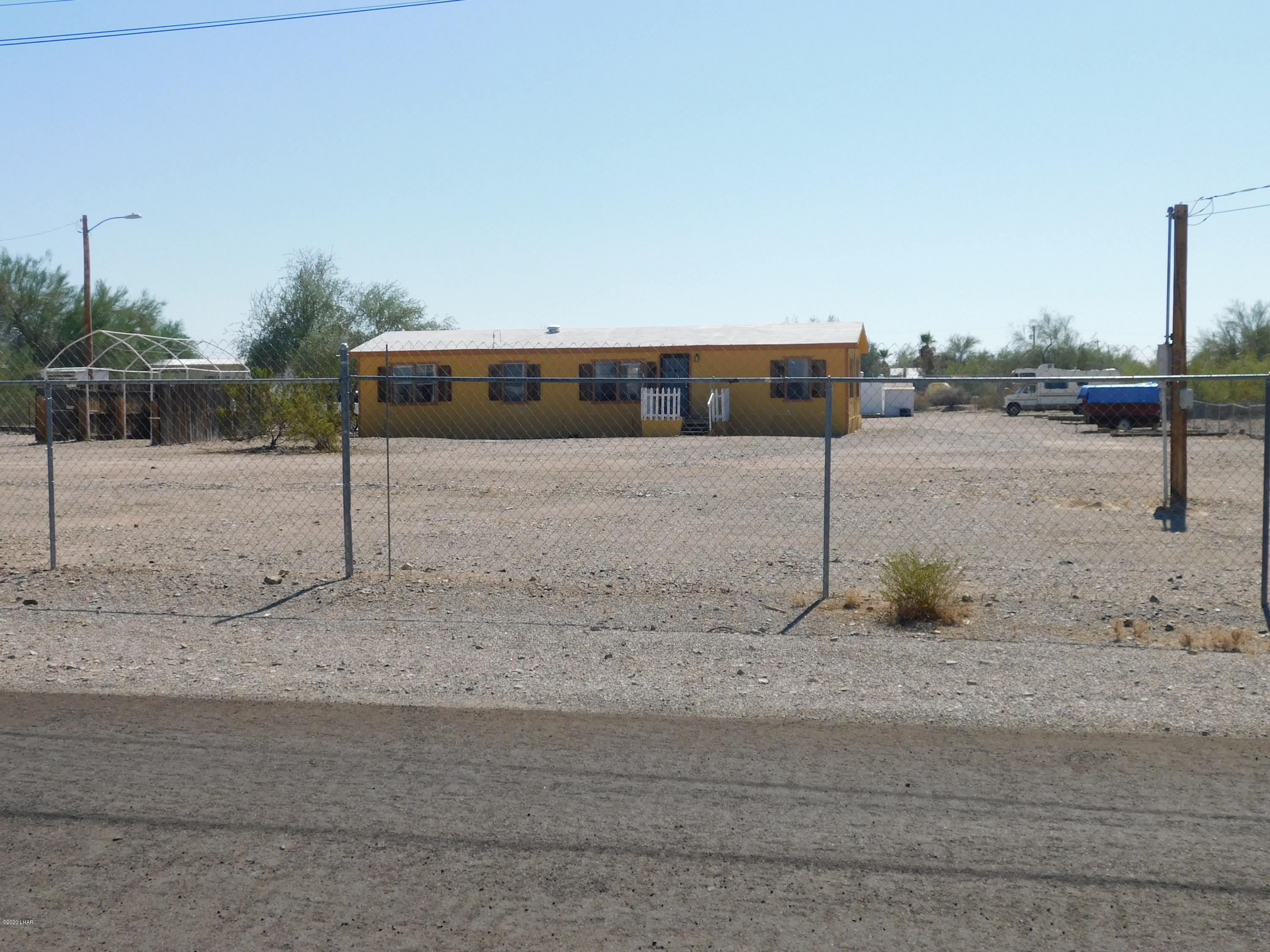 455 Mayflower Street Quartzsite, AZ 85346 - Photo 2 of 32 Property is fenced at the front entrance