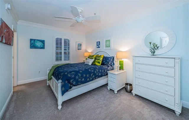 a bedroom with a bed and a view of bathroom