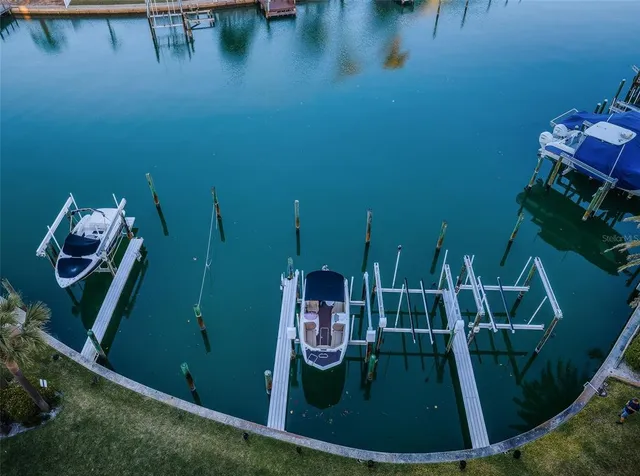 a view of a swimming pool with a balcony