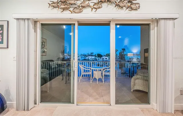 a kitchen with a table and chairs in it