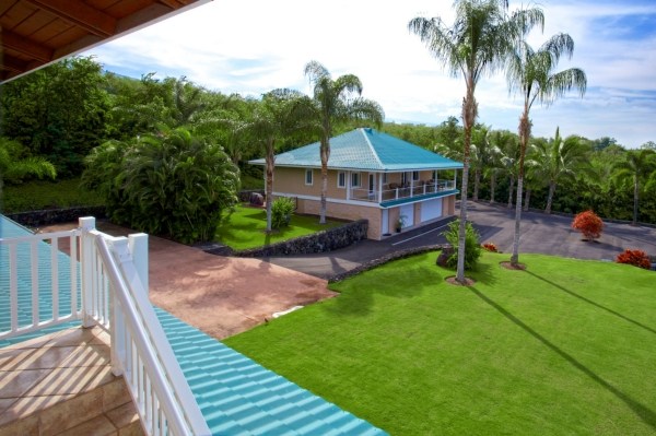 82-5970 Napoopoo Road Captain Cook, HI 96704 - Photo 20 of 24 a view of a house with a yard