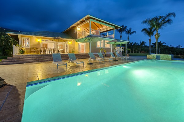 82-5970 Napoopoo Road Captain Cook, HI 96704 - Photo 3 of 24 a view of a house with swimming pool