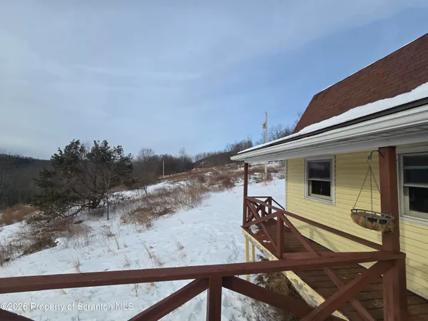 a view of a backyard of a house