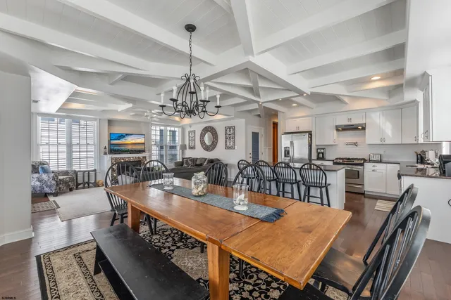 a very nice looking dining room with furniture