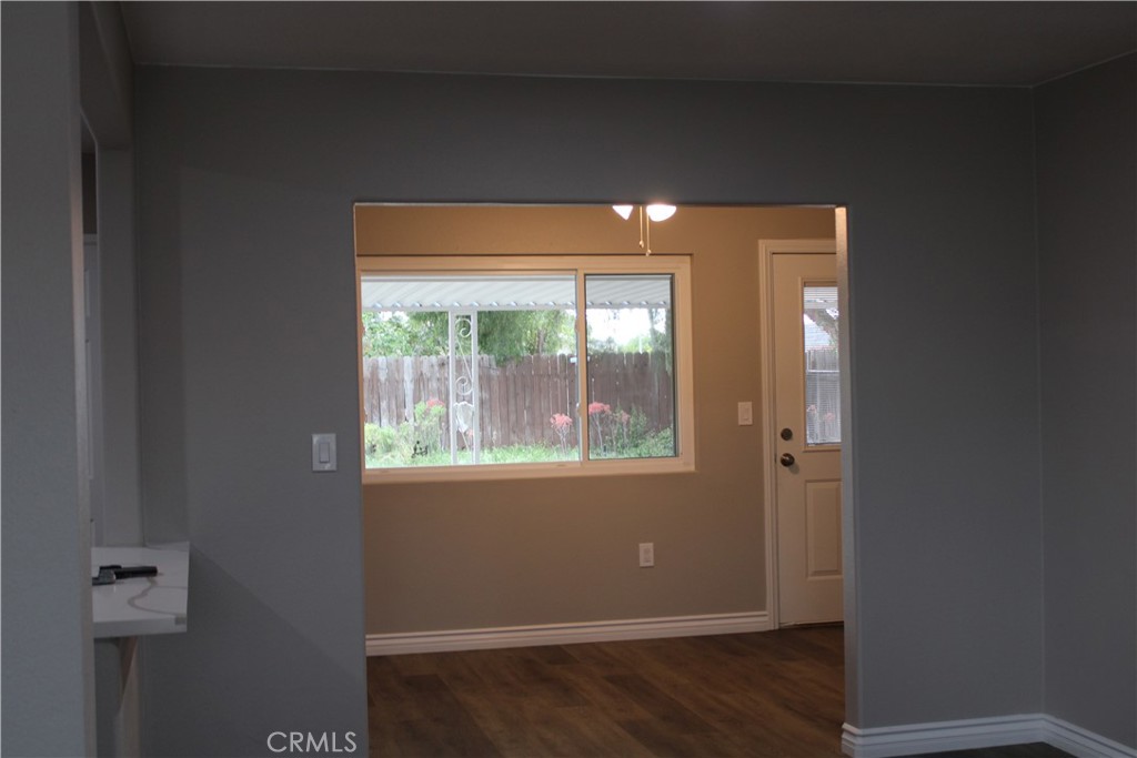 26231 Pine Valley Road Menifee, CA 92586 - Photo 14 of 17 Looking into den/family room from living room. View of backyard.