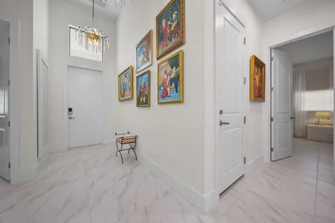 a view of a hallway with workspace