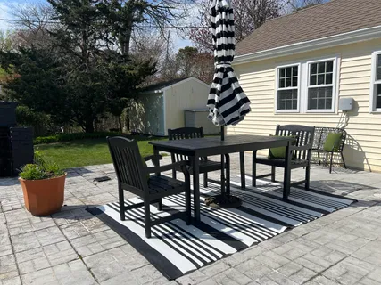 a view of a terrace with sitting area