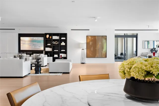 a bedroom with furniture and a flat screen tv