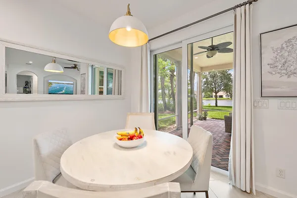 a kitchen with stainless steel appliances granite countertop a stove oven and a refrigerator