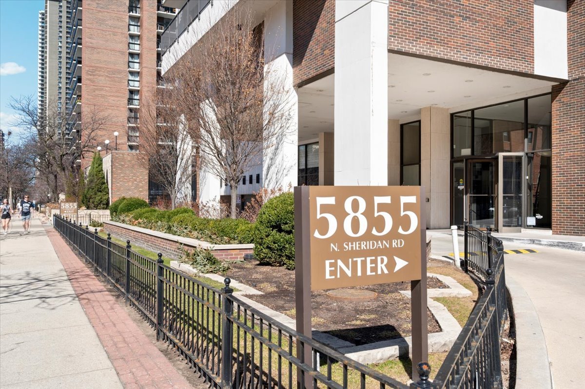 5855 North Sheridan Road, Unit 25G Chicago, IL 60660 - Photo 2 of 29 a sign on the side of a building
