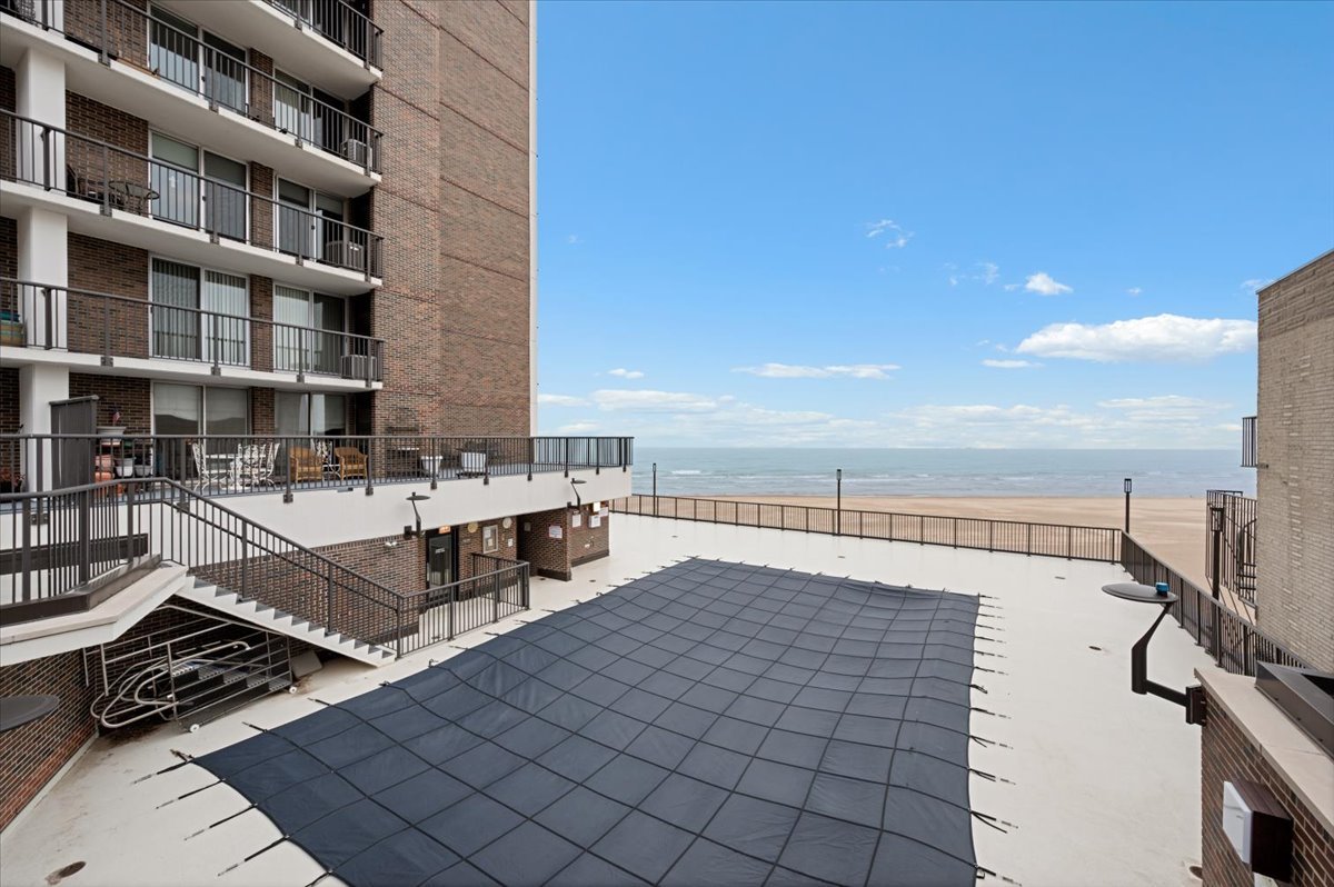 5855 North Sheridan Road, Unit 25G Chicago, IL 60660 - Photo 24 of 29 a view of building with outdoor space