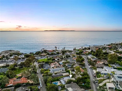 an aerial view of beach and ocean