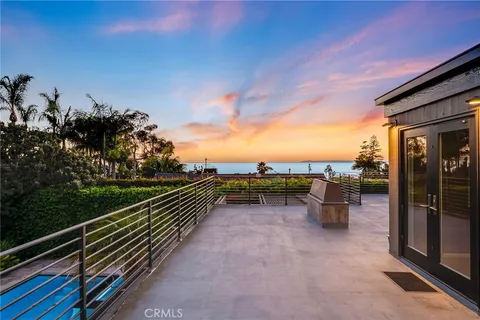 a view of a terrace with outdoor seating