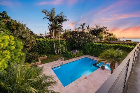 a view of a backyard with plants