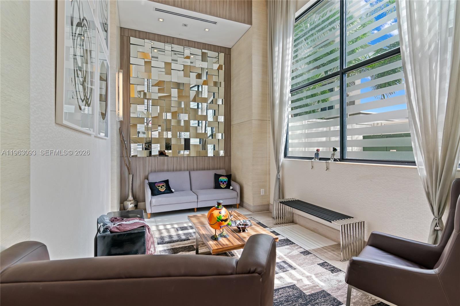 999 Southwest 1st Avenue, Unit 2411 Miami, FL 33130 - Photo 33 of 72 a living room with furniture and a window