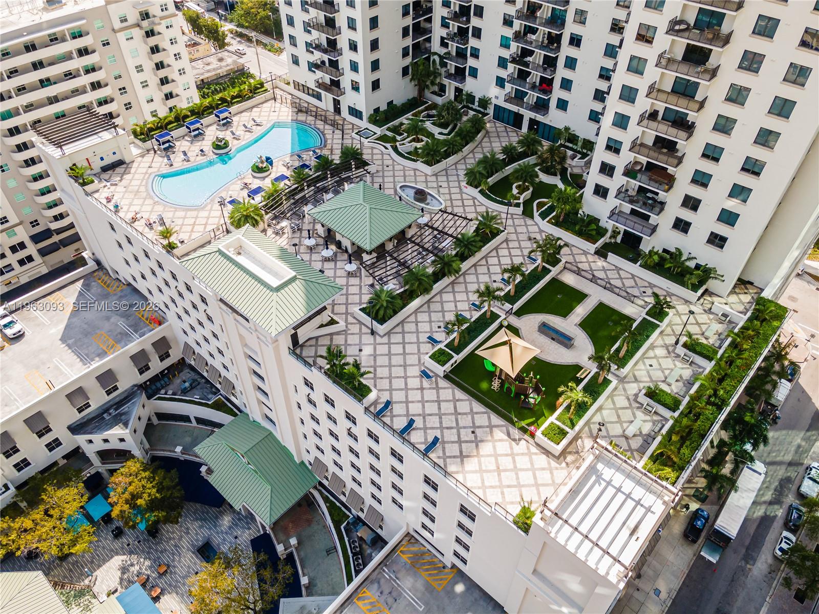 999 Southwest 1st Avenue, Unit 2411 Miami, FL 33130 - Photo 65 of 72 an aerial view of a house with a garden