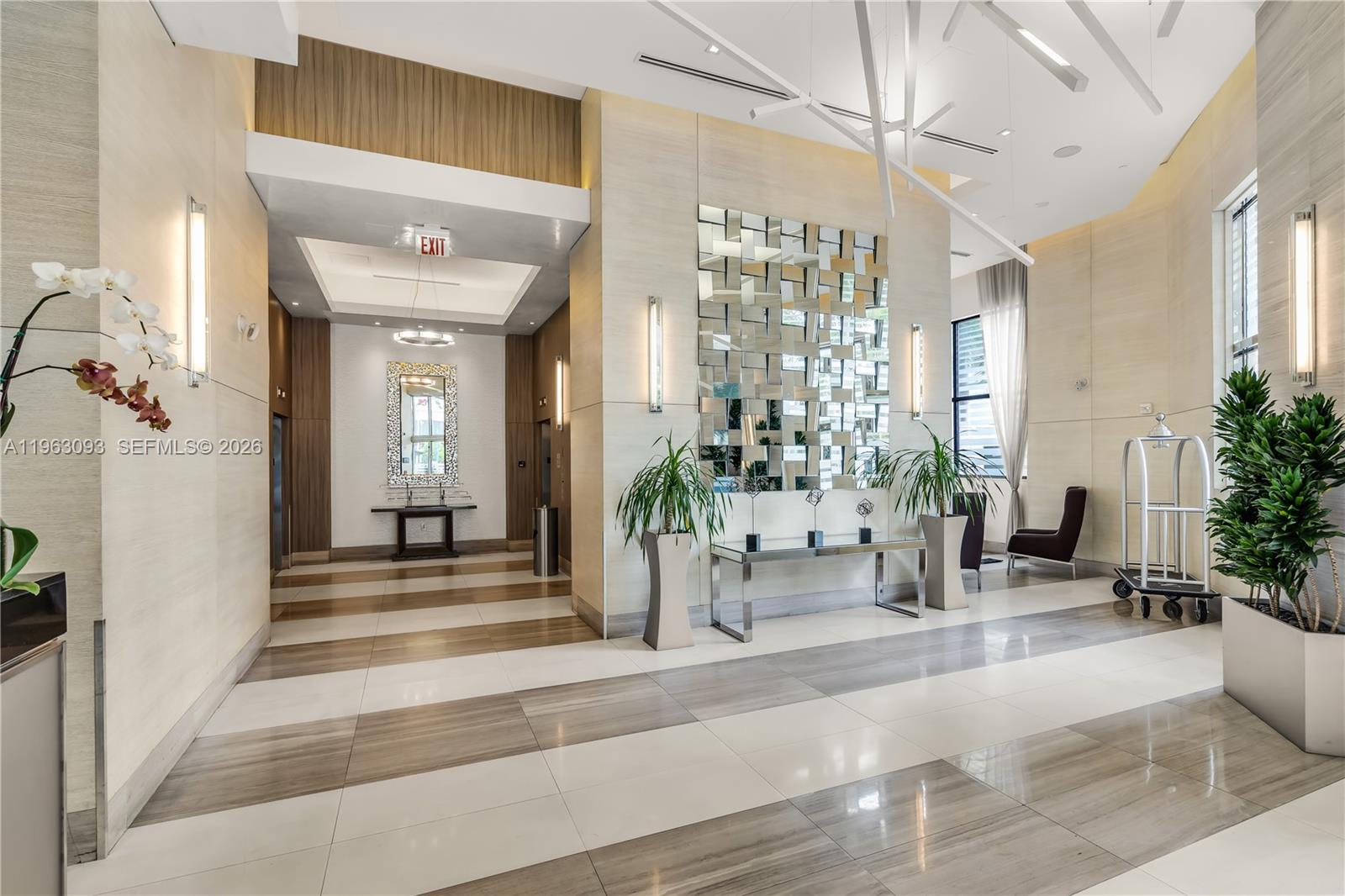 999 Southwest 1st Avenue, Unit 2411 Miami, FL 33130 - Photo 67 of 72 a view of a lobby with furniture and windows