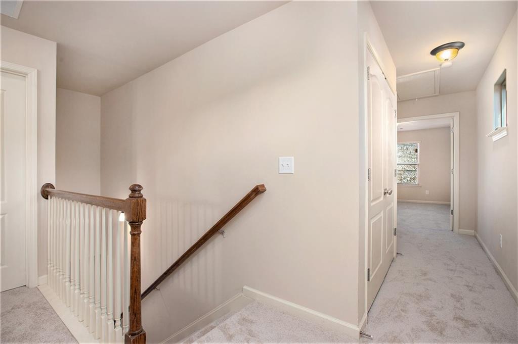 2426 Bellyard Drive Buford, GA 30519 - Photo 14 of 25 a view of a hallway with a hallway
