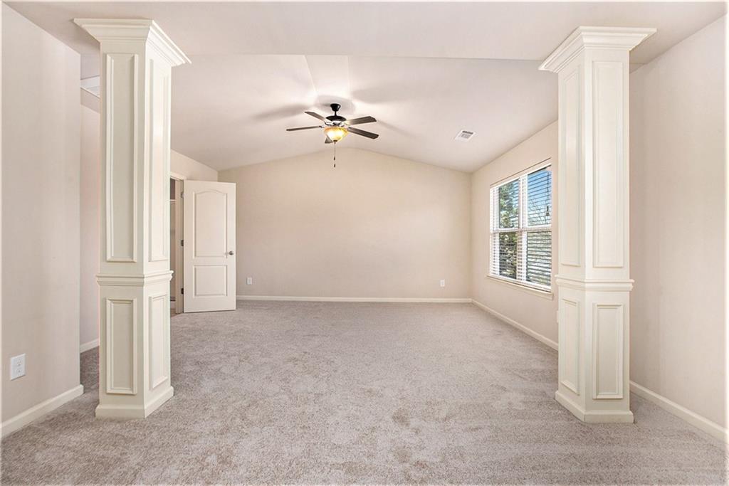 2426 Bellyard Drive Buford, GA 30519 - Photo 16 of 25 a view of empty room with a ceiling fan
