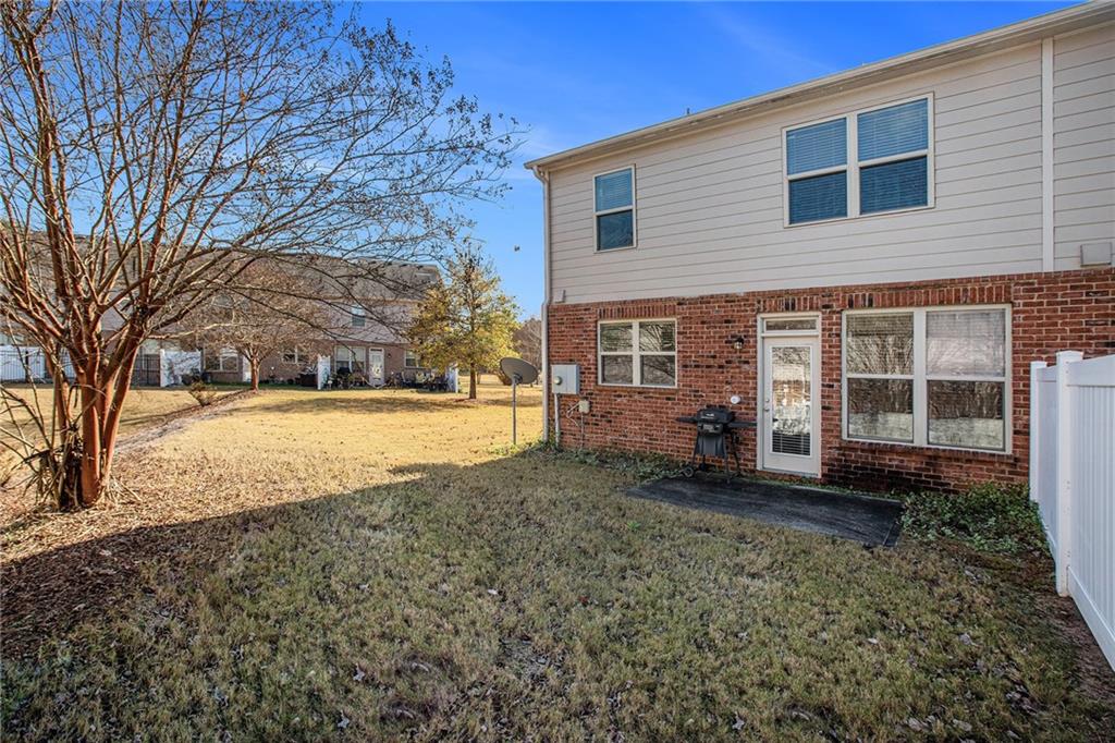 2426 Bellyard Drive Buford, GA 30519 - Photo 25 of 25 a view of house with yard