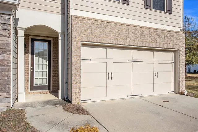 a view of a brick house with windows