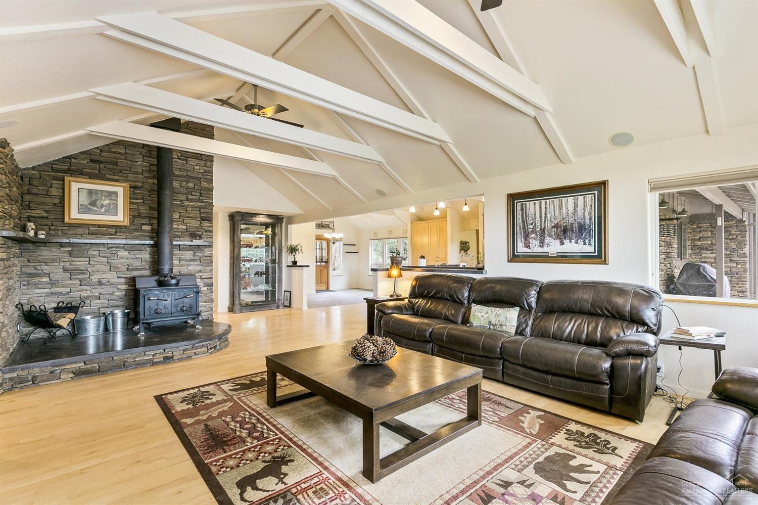 62770 Stenkamp Road Bend, OR 97701 - Photo 6 of 23 Great Room with beautiful stone work and