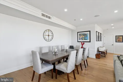 a view of a dining room with furniture and a table