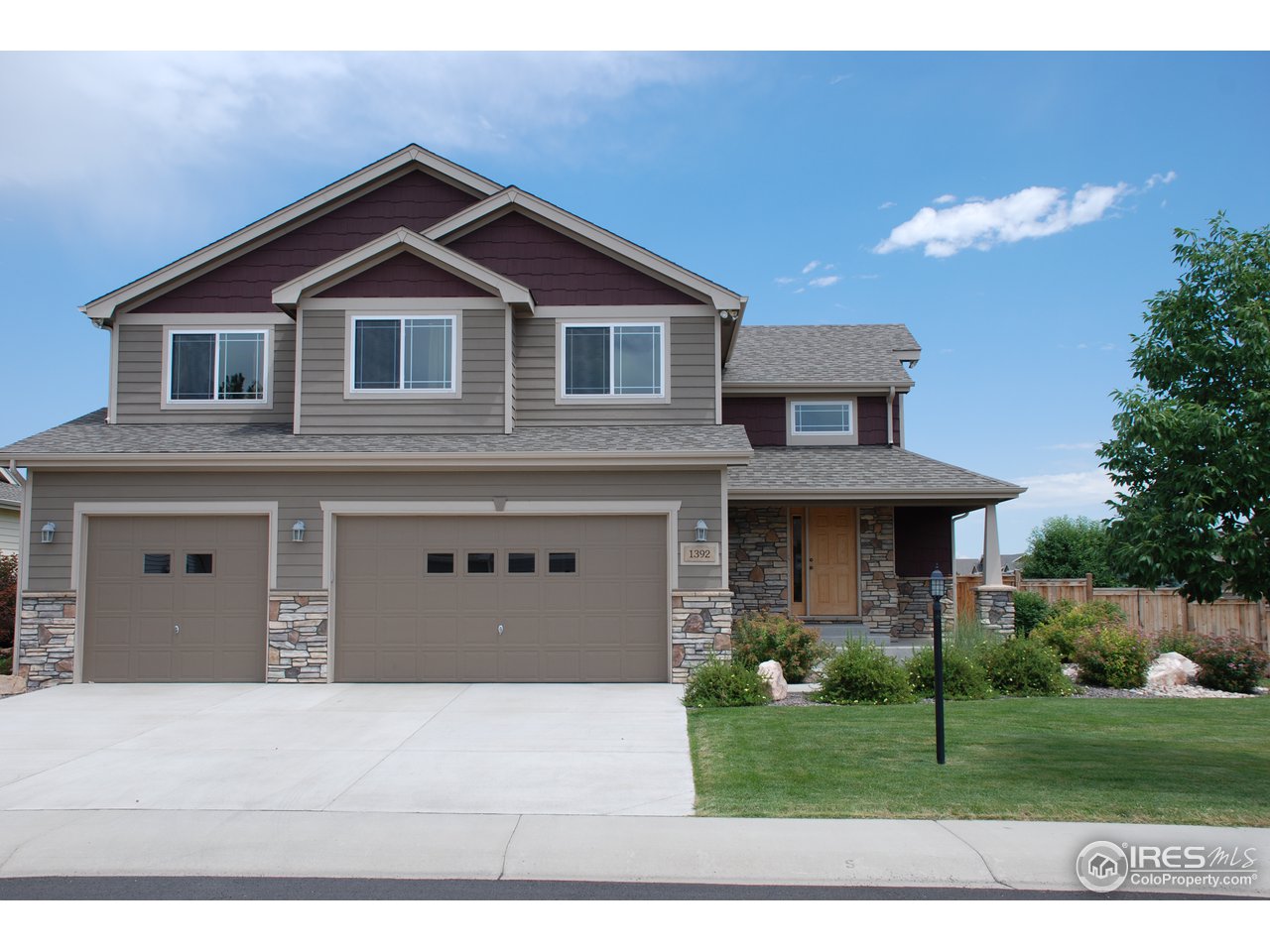 1392 Ripple Court Fort Collins, CO 80521 - Photo 1 of 18 front view faces West