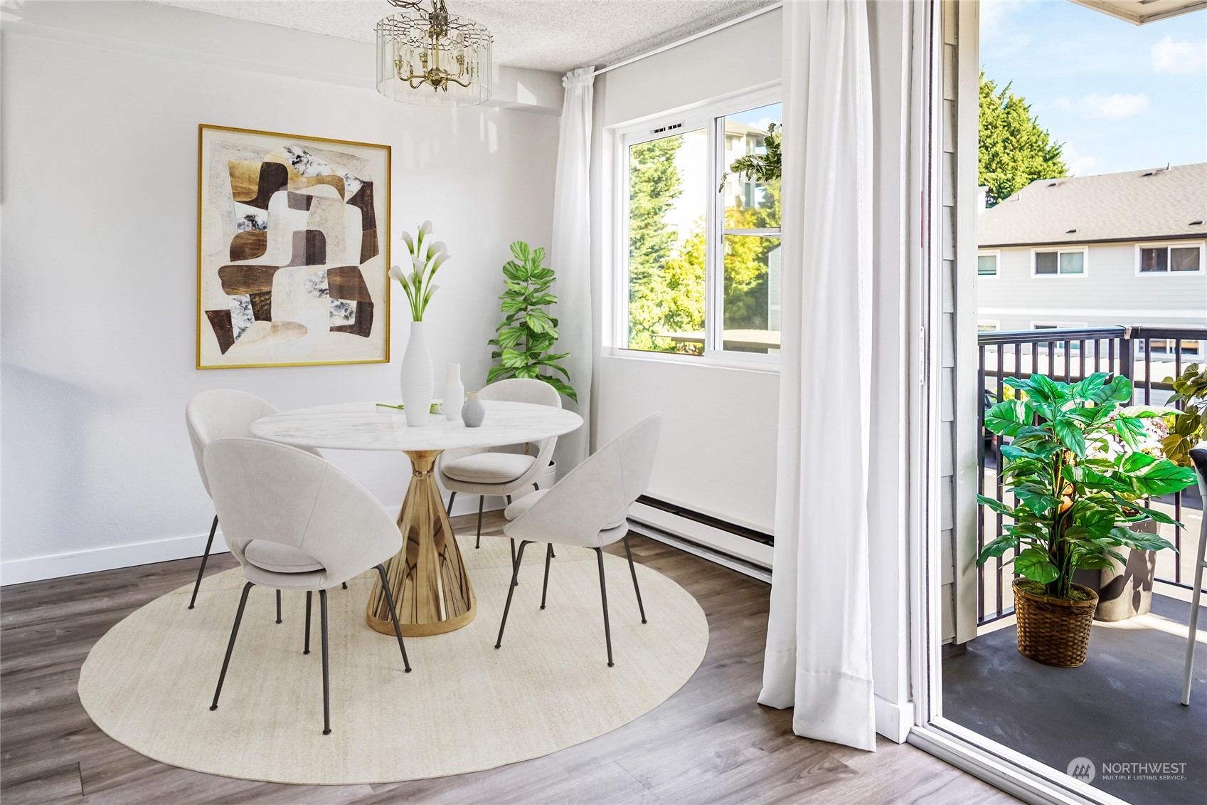 15210 Macadam Road South, Unit D205 Tukwila, WA 98188 - Photo 8 of 11 a view of a dining room with furniture window and wooden floor