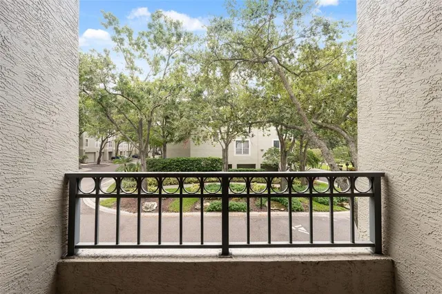 a kitchen with a refrigerator and a sink