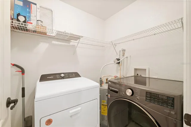 a view of a deck with table and chairs and wooden floor