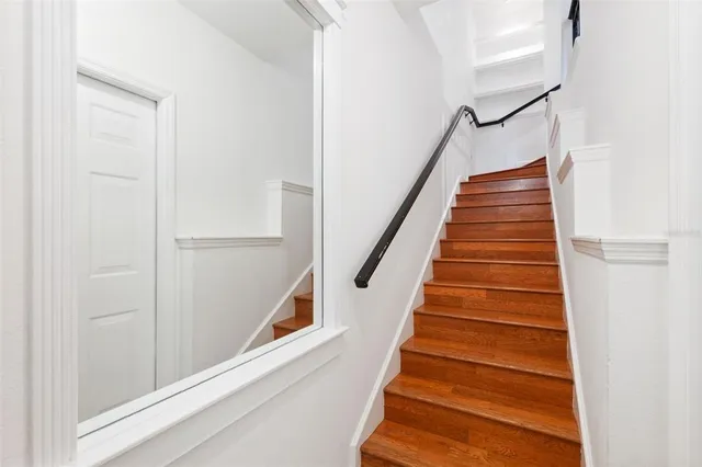 a view of a kitchen with a sink and a window