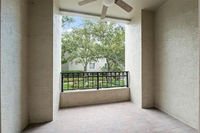 a view of a room with wooden floor and staircase
