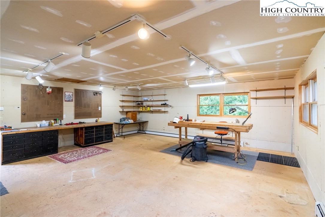 2530 Bear Wallow Road Lansing, NC 28643 - Photo 43 of 48 a living room with furniture and a kitchen