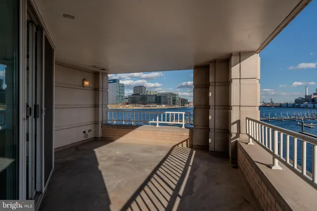 a view of balcony with a potted plant