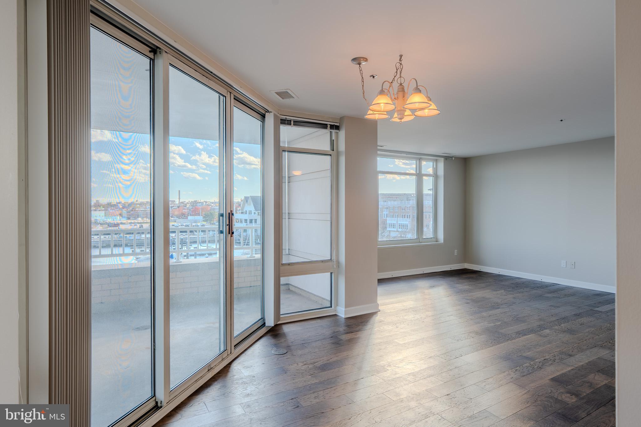 100 Harborview Drive, Unit 302 Baltimore, MD 21230 - Photo 17 of 48 a view of an entryway with wooden floor door