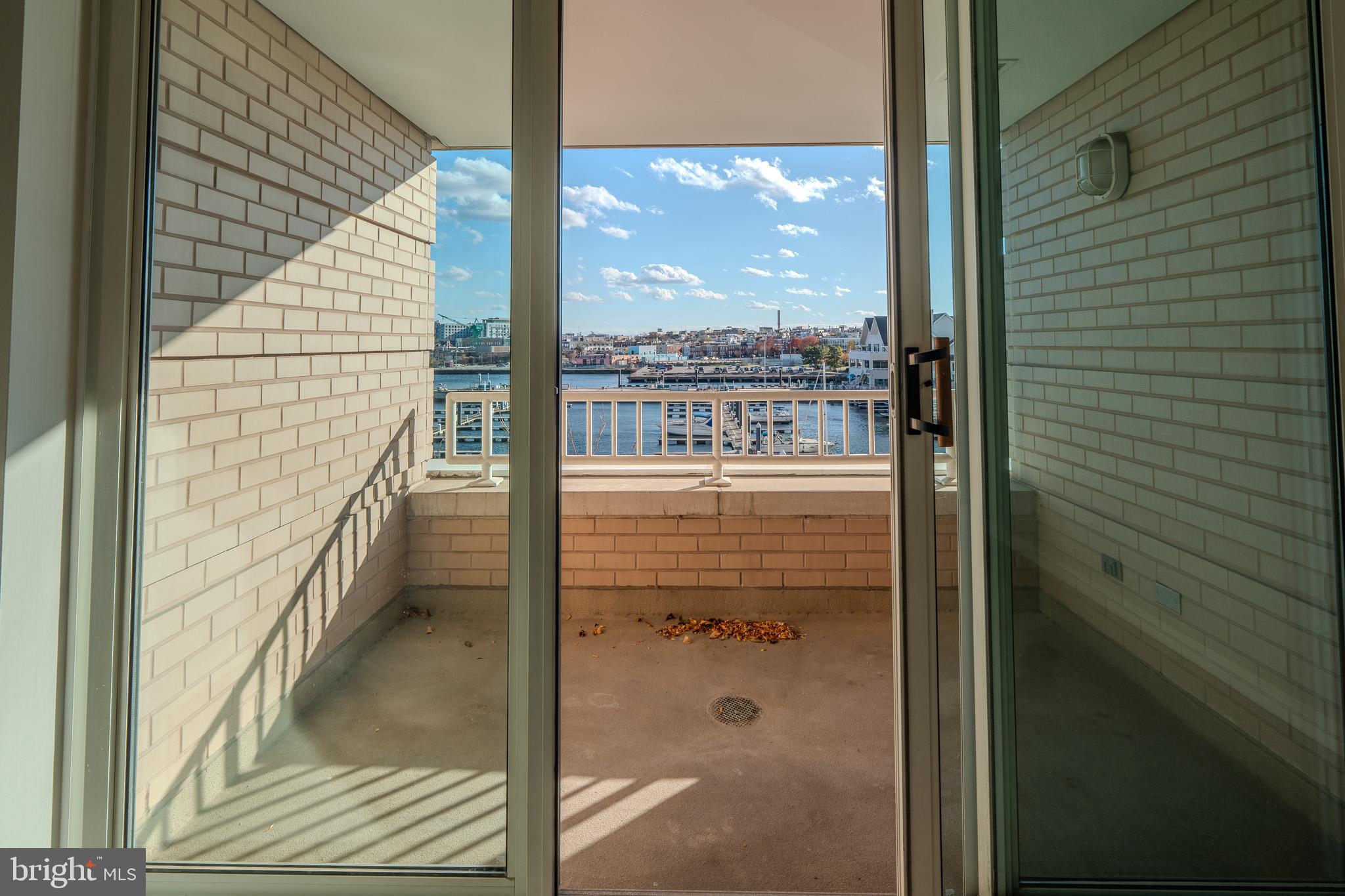 100 Harborview Drive, Unit 302 Baltimore, MD 21230 - Photo 28 of 48 a bathroom with a shower