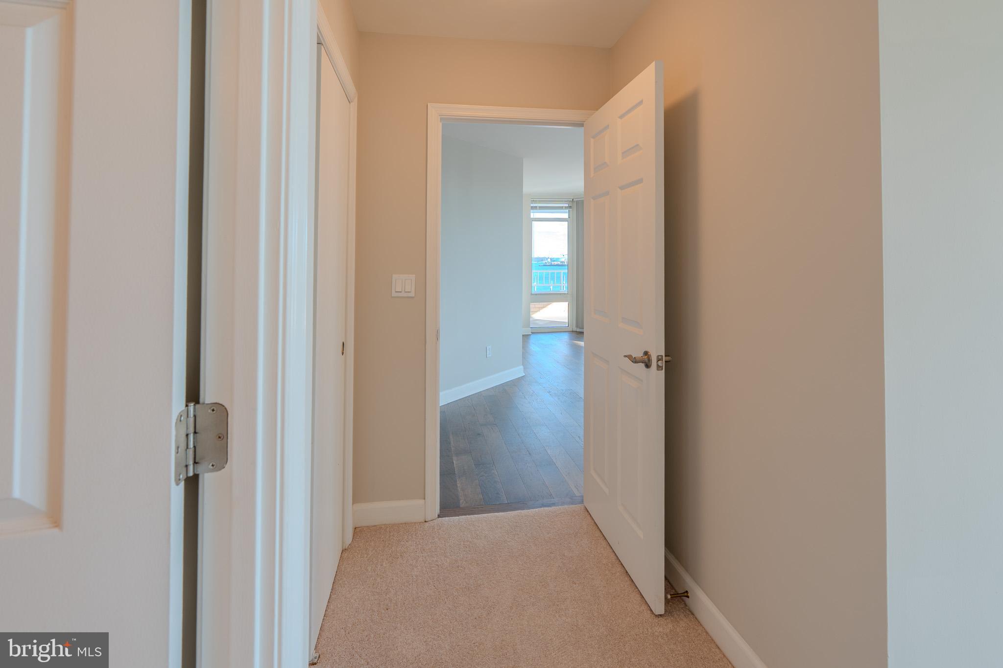 100 Harborview Drive, Unit 302 Baltimore, MD 21230 - Photo 30 of 48 a view of a bathroom from a hallway