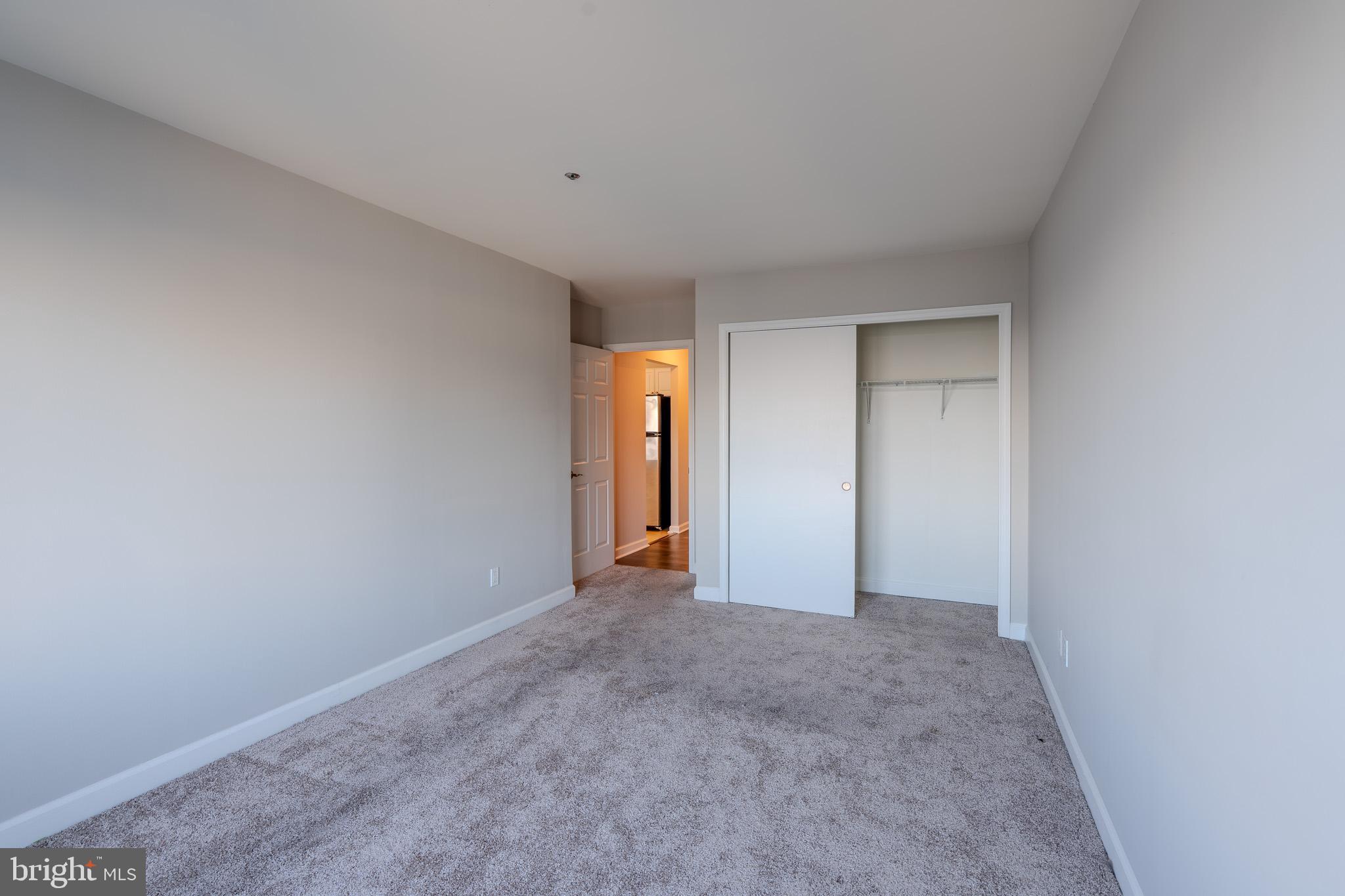 100 Harborview Drive, Unit 302 Baltimore, MD 21230 - Photo 39 of 48 a view of an empty room and window