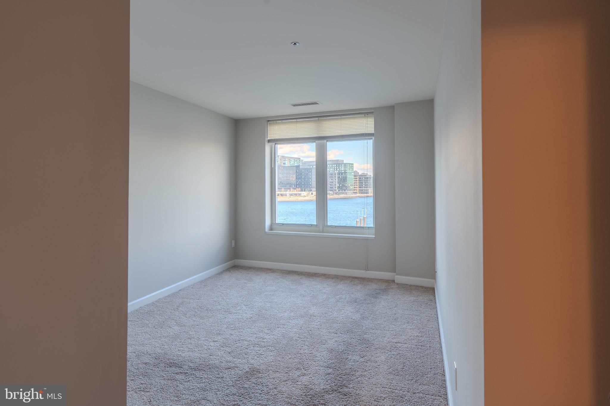 100 Harborview Drive, Unit 302 Baltimore, MD 21230 - Photo 40 of 48 a view of an empty room with a window