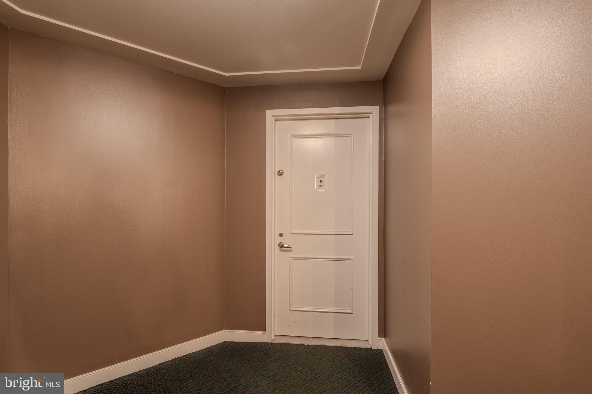 100 Harborview Drive, Unit 302 Baltimore, MD 21230 - Photo 5 of 48 a view of small space with wooden floor