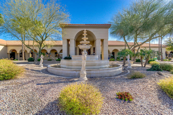 3301 South Goldfield Road, Unit 2041 Apache Junction, AZ 85119 - Photo 20 of 26 a view of a yard with fountain