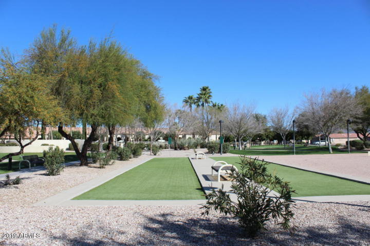 3301 South Goldfield Road, Unit 2041 Apache Junction, AZ 85119 - Photo 21 of 26 a view of a park with large trees