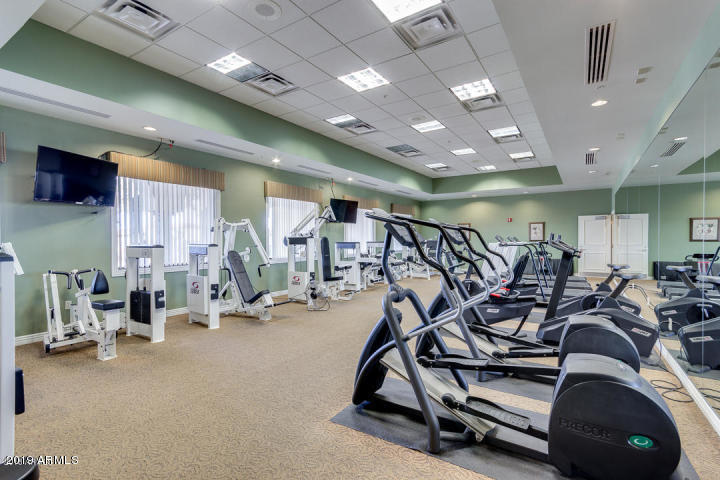 3301 South Goldfield Road, Unit 2041 Apache Junction, AZ 85119 - Photo 23 of 26 a view of a room with gym equipment