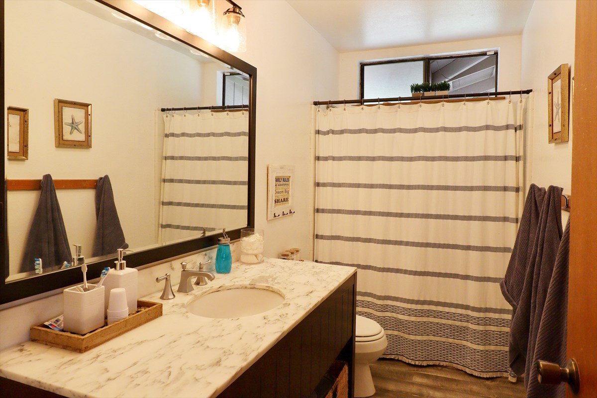 17-212 Volcano Road Keaau, HI 96749 - Photo 12 of 24 a bathroom with a sink and a mirror