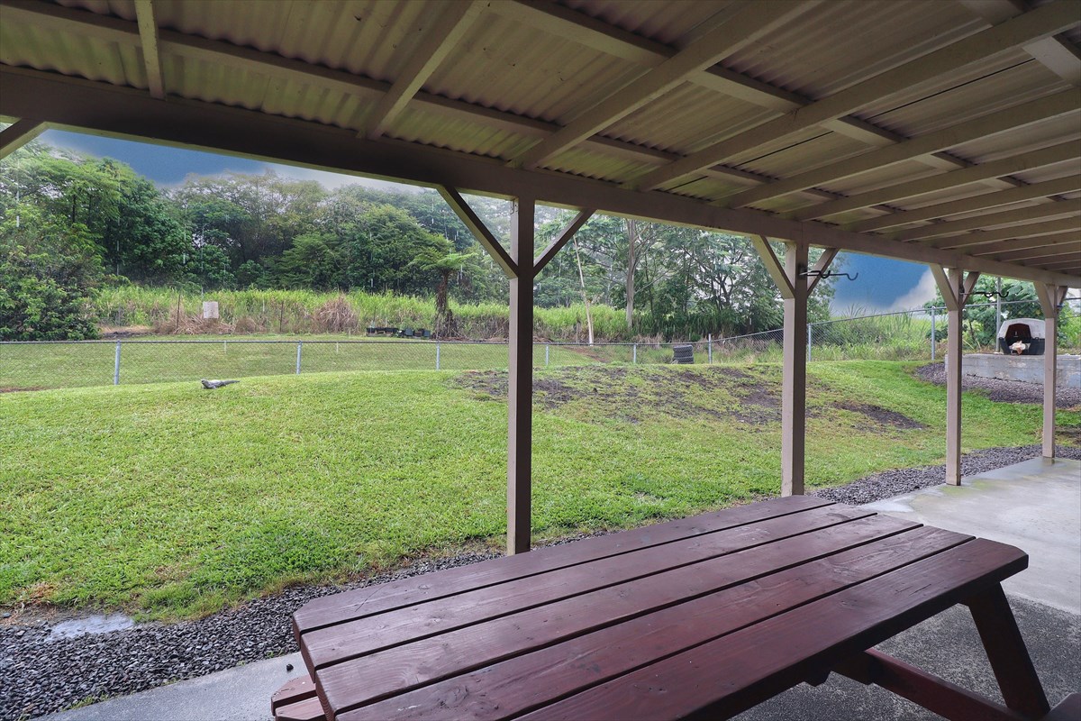 17-212 Volcano Road Keaau, HI 96749 - Photo 15 of 24 a view of a two chairs in the deck
