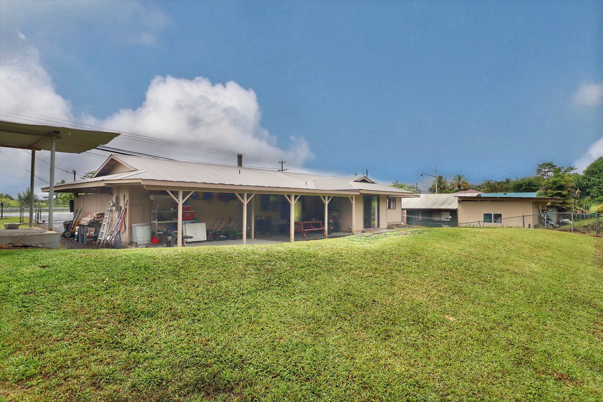 17-212 Volcano Road Keaau, HI 96749 - Photo 17 of 24 a front view of a house with a garden
